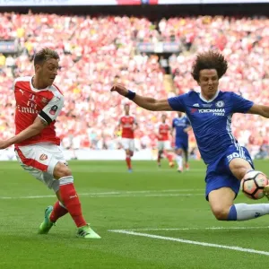 Mesut Ozil vs. David Luiz: A FA Cup Final Showdown at the Emirates Mesut Ozil vs. David Luiz: A FA Cup Final Showdown at the Emirates
