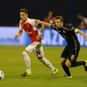 Mesut Ozil vs. Domagoj Antolic: Tense Clash in Dinamo Zagreb vs. Arsenal UEFA Champions League Match, 2015