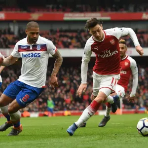 Mesut Ozil vs Glen Johnson: A Premier League Battle at Emirates Stadium Mesut Ozil vs Glen Johnson: A Premier League Battle at Emirates Stadium