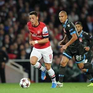 Mesut Ozil vs. Gokhan Inler: Battle in the Arsenal v Napoli UEFA Champions League Match