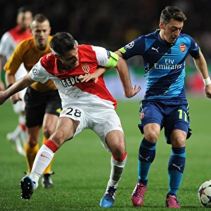 Mesut Ozil vs. Jeremy Toulalan: Intense Battle in Monaco's UCL Clash Against Arsenal