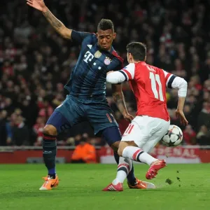 Mesut Ozil vs Jerome Boateng: Penalty Showdown in Arsenal vs Bayern Munich UCL Clash Mesut Ozil vs Jerome Boateng: Penalty Showdown in Arsenal vs Bayern Munich UCL Clash