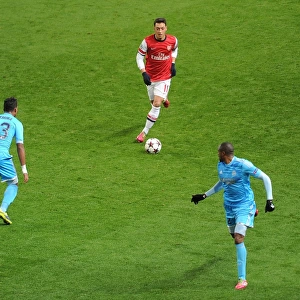 Mesut Ozil vs. Mario Lemina and Kassim Abdallah: Intense Battle at Arsenal v Marseille, UEFA Champions League (2013-14)