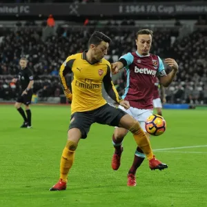 Mesut Ozil vs Mark Noble: Intense Battle in West Ham United vs Arsenal Premier League Clash Mesut Ozil vs Mark Noble: Intense Battle in West Ham United vs Arsenal Premier League Clash