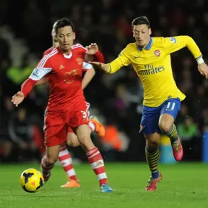 Mesut Ozil vs Maya Yoshida: Clash at St. Mary's - Southampton v Arsenal, Premier League 2013-14 Mesut Ozil vs Maya Yoshida: Clash at St. Mary's - Southampton v Arsenal, Premier League 2013-14