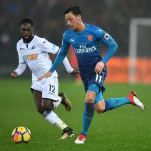 Mesut Ozil vs. Nathan Dyer: A Premier League Battle at Swansea's Liberty Stadium (Arsenal vs. Swansea City, 2017-18) Mesut Ozil vs. Nathan Dyer: A Premier League Battle at Swansea's Liberty Stadium (Arsenal vs. Swansea City, 2017-18)