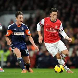 Mesut Ozil vs. Scott Parker: Clash at the Emirates - Arsenal v Fulham, Premier League 2013-14 Mesut Ozil vs. Scott Parker: Clash at the Emirates - Arsenal v Fulham, Premier League 2013-14
