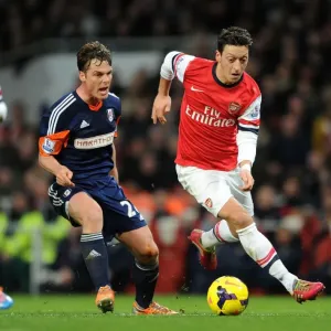 Mesut Ozil vs. Scott Parker: A Premier League Face-Off at the Emirates Mesut Ozil vs. Scott Parker: A Premier League Face-Off at the Emirates