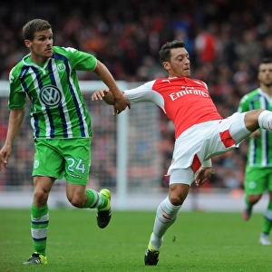 Mesut Ozil vs. Sebastian Jung: A Clash of Talents at the Emirates Cup 2015/16