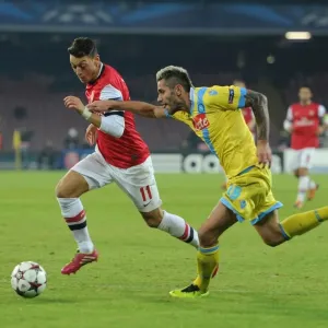 Mesut Ozil vs Valon Behrami: A Battle in the UEFA Champions League between Napoli and Arsenal Mesut Ozil vs Valon Behrami: A Battle in the UEFA Champions League between Napoli and Arsenal