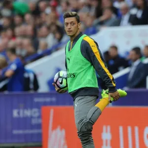 Mesut Ozil Warming Up: Arsenal's Star Player Prepares for Leicester City Clash, 2016-17 Premier League