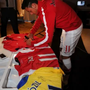 Mesut Ozil's Munich Debut: Arsenal's New Signing at Photo Shoot