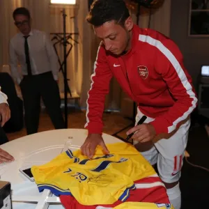 Mesut Ozil's Munich Debut: Arsenal's New Signing at Photo Shoot