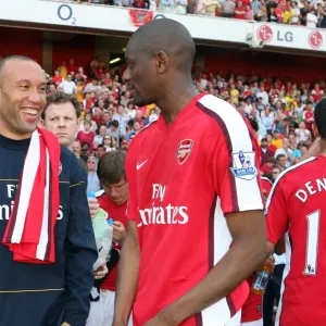 Mikael Silvestre and Abou Diaby (Arsenal) after the match