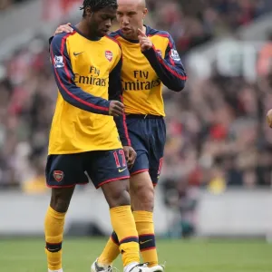 Mikael Silvestre and Alex Song (Arsenal) Mikael Silvestre and Alex Song (Arsenal)