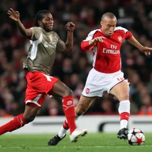 Mikael Silvestre (Arsenal) Dieudonne Mbokani (Liege)