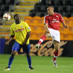 Mikael Silvestre (Arsenal) Vincent Pericard (Stoke) Mikael Silvestre (Arsenal) Vincent Pericard (Stoke)