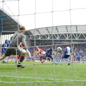 Mikael Silvestre heads past Wigan goalkeeper Chris Kirkland to score the 2nd Arsenal goal