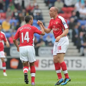 Mikael Silvestre and Theo Walcott: Celebrating Arsenal's 2nd Goal Against Wigan Athletic, FA Premier League, 2010