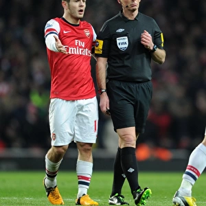 Mike Dean and Jack Wilshere: A Moment of Discussion during Arsenal vs Manchester City (2012-13)
