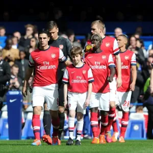 Mikel Arteta (Arsenal) with the Arsenal mascot. Chelsea 6: 0 Arsenal. Barclays Premier League Mikel Arteta (Arsenal) with the Arsenal mascot. Chelsea 6: 0 Arsenal. Barclays Premier League