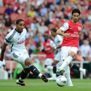 Mikel Arteta (Arsenal) Ashley Williams (Swansea). Arsenal 1: 0 Swansea City