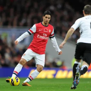 Mikel Arteta (Arsenal) Chris Baird (Fulham). Arsenal 3: 3 Fulham. Barclays Premier League