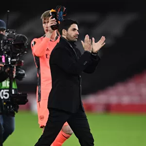 Mikel Arteta Celebrates Europa League Victory with Arsenal Fans at Emirates Stadium