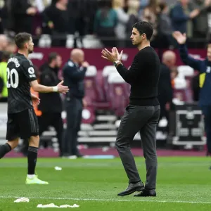 Mikel Arteta Celebrates Victory with Arsenal Fans: West Ham United vs. Arsenal, Premier League 2022-23