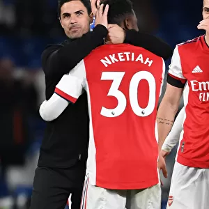 Mikel Arteta and Eddie Nketiah Celebrate Arsenal's Win at Chelsea (April 2022)
