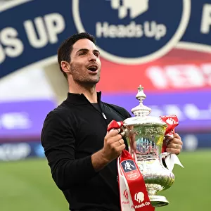 Mikel Arteta Lifts Empty FA Cup: Arsenal's Victory Over Chelsea in an Empty Wembley Stadium