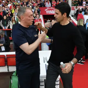 Mikel Arteta and Steve Cooper Embrace Ahead of Nottingham Forest vs. Arsenal Premier League Clash (2022-2023)