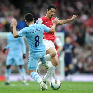 Mikel Arteta takes the ball off David Pizzaro (Man City) before scoring Arsenals goal Mikel Arteta takes the ball off David Pizzaro (Man City) before scoring Arsenals goal