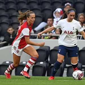 MIND Series: Lia Walti of Arsenal Closes Down Silvana Flores of Tottenham in Intense Women's Football Match