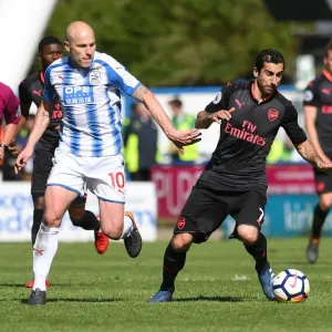 Mkhitaryan vs Mooy: Intense Battle in Huddersfield Town vs Arsenal Premier League Clash Mkhitaryan vs Mooy: Intense Battle in Huddersfield Town vs Arsenal Premier League Clash