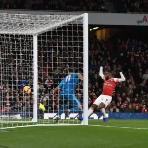 Mkhitaryan's Strike: Lacazette Celebrates Past Rui Patricio in Arsenal's Win vs. Wolverhampton Wanderers