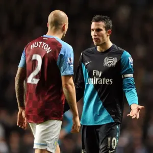 A Moment of Unity: Robin van Persie and Alan Hutton's Chat Amidst the Aston Villa vs. Arsenal Rivalry (2011-12)