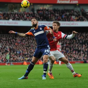 Monreal Stands Firm Against Dejagah: Arsenal vs Fulham, Premier League 2013-14 Monreal Stands Firm Against Dejagah: Arsenal vs Fulham, Premier League 2013-14