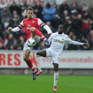 Monreal vs. Dyer: Intense Battle in Swansea City vs. Arsenal Premier League Clash Monreal vs. Dyer: Intense Battle in Swansea City vs. Arsenal Premier League Clash