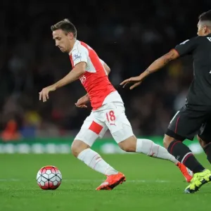 Monreal vs Firmino: Intense Rivalry Unfolds - Arsenal vs Liverpool, Premier League 2015/16 Monreal vs Firmino: Intense Rivalry Unfolds - Arsenal vs Liverpool, Premier League 2015/16