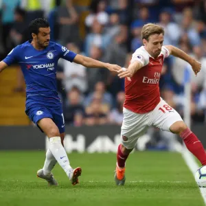 Monreal vs Pedro: A Football Rivalry Ignites at Stamford Bridge