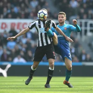 Mustafi vs Slimani: Intense Battle in Newcastle United vs Arsenal Premier League Clash