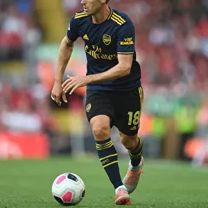 Nacho Monreal in Action: A Riveting Moment from the Liverpool vs. Arsenal Premier League Clash 2019-20