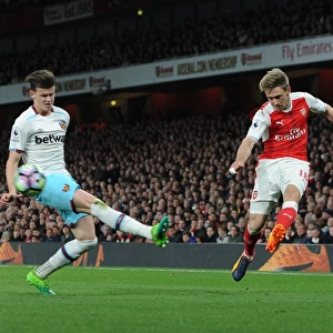 Nacho Monreal (Arsenal) Sam Byram (West Ham). Arsenal 3: 0 West Ham United. Premier League