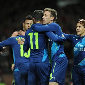 Nacho Monreal celebrates scoring Arsenals 1st goal with Mesut Ozil. Manchester United 1: 2 Arsenal