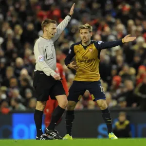 Nacho Monreal Contests Referee Decision During Intense Liverpool vs. Arsenal Premier League Clash (2015-16) Nacho Monreal Contests Referee Decision During Intense Liverpool vs. Arsenal Premier League Clash (2015-16)