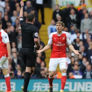 Nacho Monreal Shown Yellow Card by Referee Michael Oliver in Tottenham Hotspur vs Arsenal Premier League Clash Nacho Monreal Shown Yellow Card by Referee Michael Oliver in Tottenham Hotspur vs Arsenal Premier League Clash