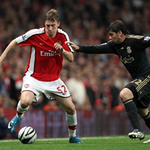 Nicklas Bendtner (Arsenal) Emiliano Insua (Liverpool)