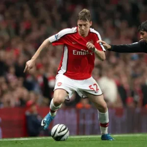 Nicklas Bendtner (Arsenal) Emiliano Insua (Liverpool) Nicklas Bendtner (Arsenal) Emiliano Insua (Liverpool)