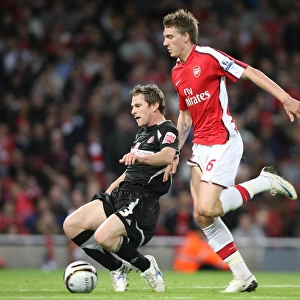 Nicklas Bendtner (Arsenal) Gary Naysmith (Sheffield United)